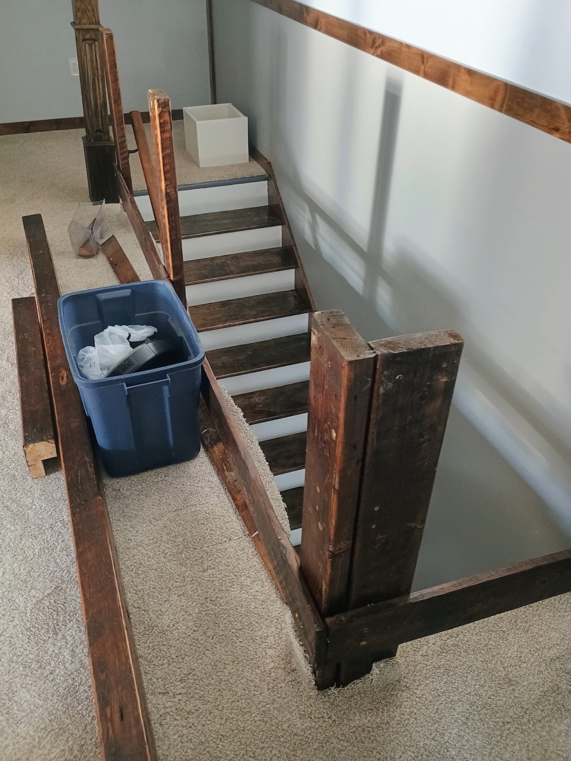 Existing stair railing removed in preparation for the custom installation